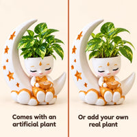Festival Moon Planter comes with an artificial plant, or add your own real plant