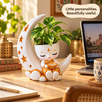 Festival Moon Planter on a sunny desk beside a laptop